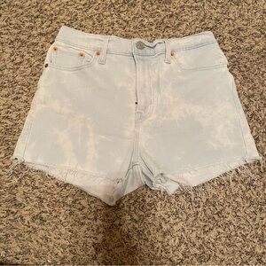 Levi’s light blue jean shorts with white wash print